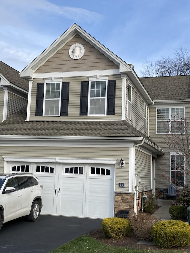 view of front of house with a garage