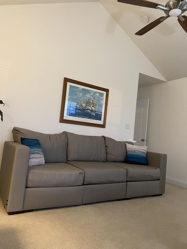 living room featuring light carpet, high vaulted ceiling, and ceiling fan