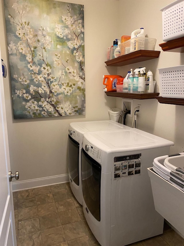 washroom featuring washing machine and dryer