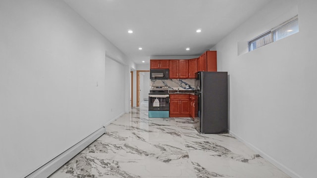 kitchen with tasteful backsplash, baseboard heating, and black appliances