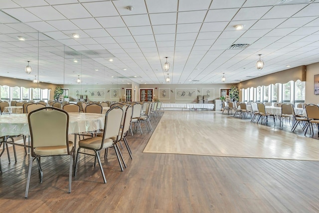 dining area with hardwood / wood-style floors and plenty of natural light