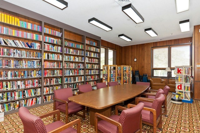 interior space featuring wooden walls