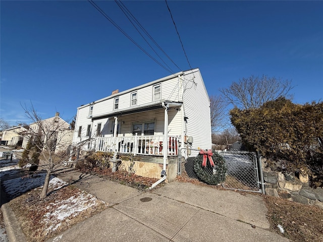 view of front of home featuring covered porch