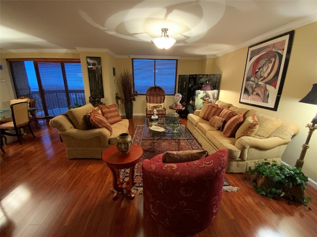 living room featuring wood-type flooring and ornamental molding