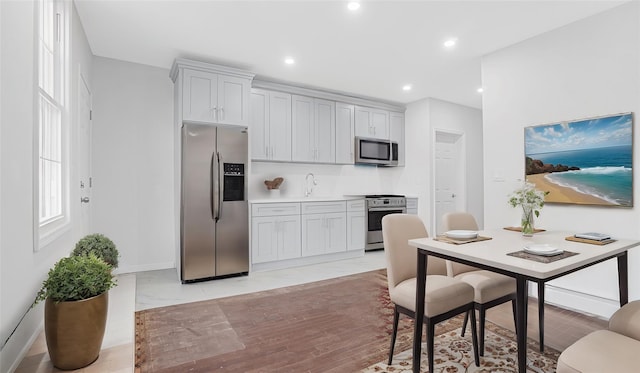 kitchen featuring appliances with stainless steel finishes and sink