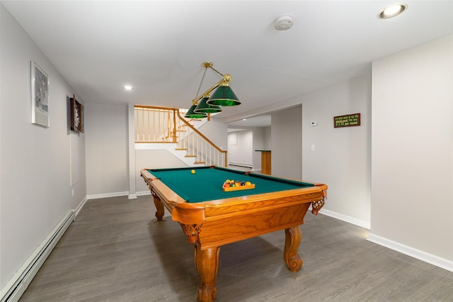 game room with wood-type flooring, billiards, and a baseboard radiator