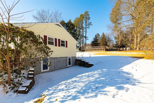 view of yard covered in snow