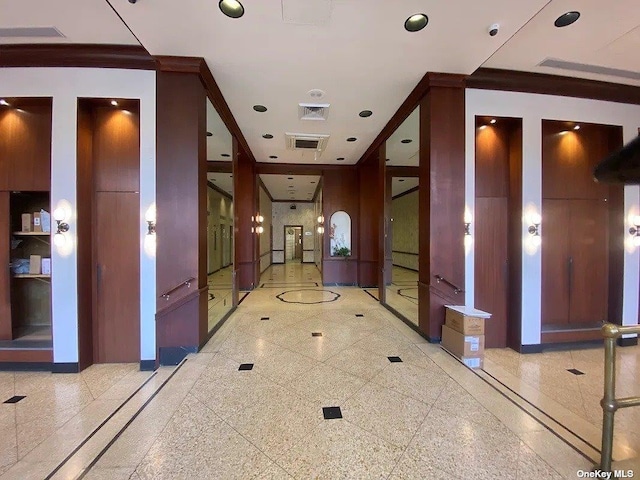 corridor with crown molding