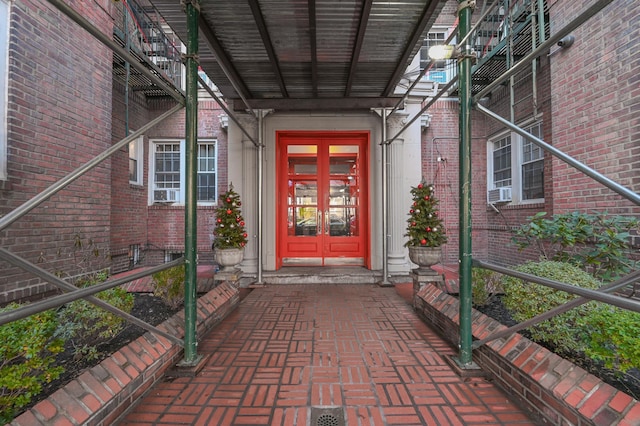 property entrance featuring french doors