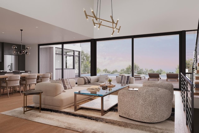 living room featuring a wealth of natural light, hardwood / wood-style floors, and an inviting chandelier