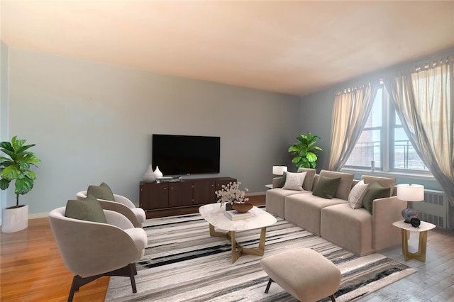 living room featuring radiator and light wood-type flooring