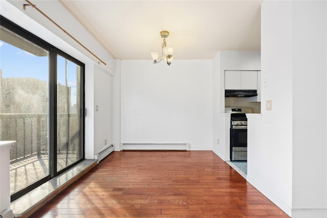 unfurnished dining area with hardwood / wood-style floors, a baseboard radiator, and a notable chandelier