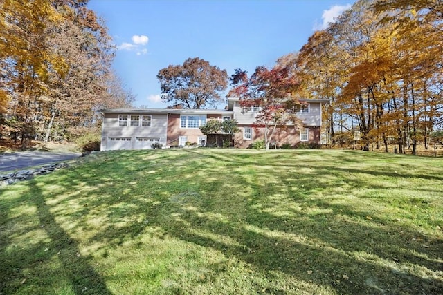 view of yard with a garage