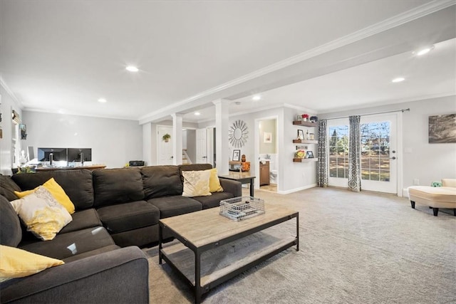 living room with crown molding and light carpet