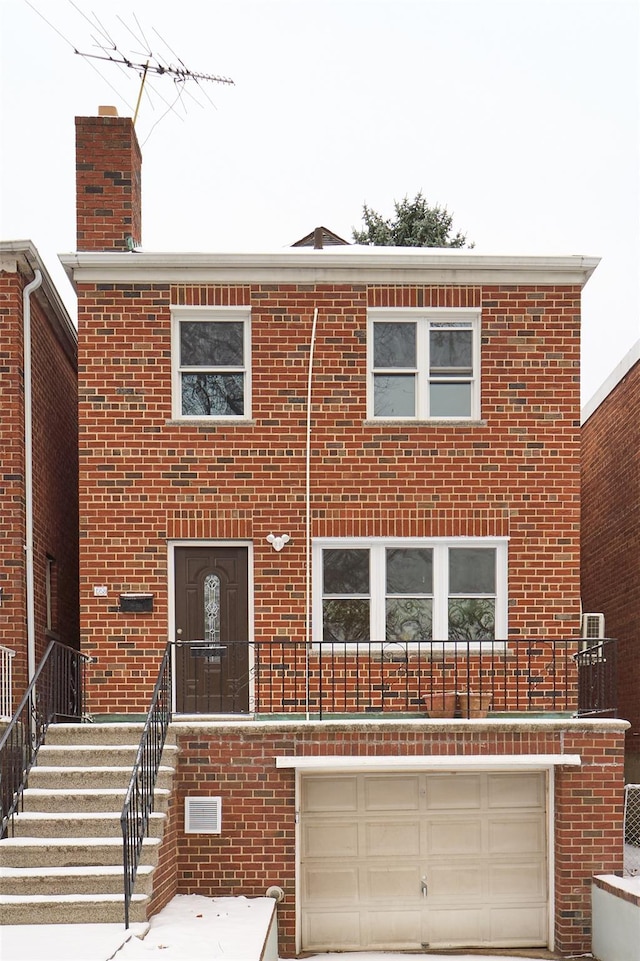 view of front of house with a garage