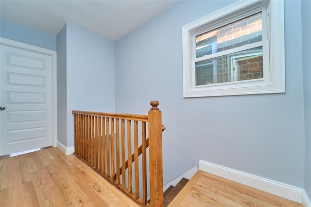 hall with light wood-type flooring