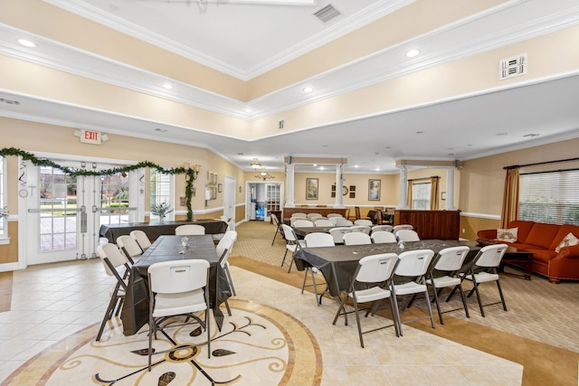 tiled dining area featuring french doors and ornamental molding