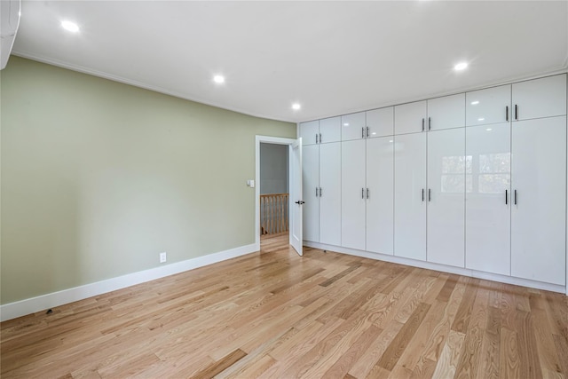 unfurnished bedroom featuring light hardwood / wood-style flooring