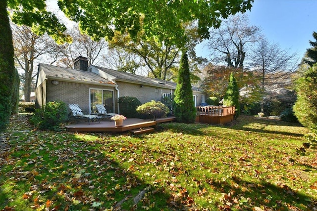 view of yard with a wooden deck