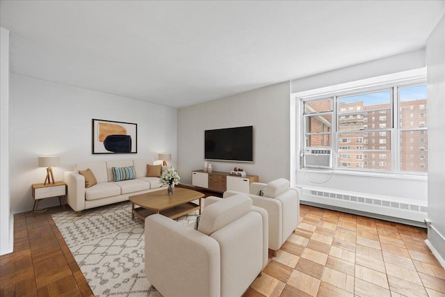 living room with cooling unit and radiator heating unit