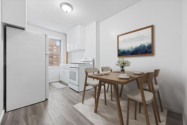 dining area featuring light hardwood / wood-style flooring