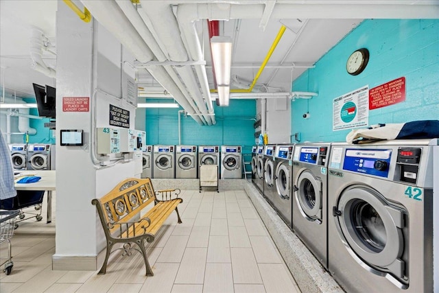 laundry room featuring washing machine and dryer