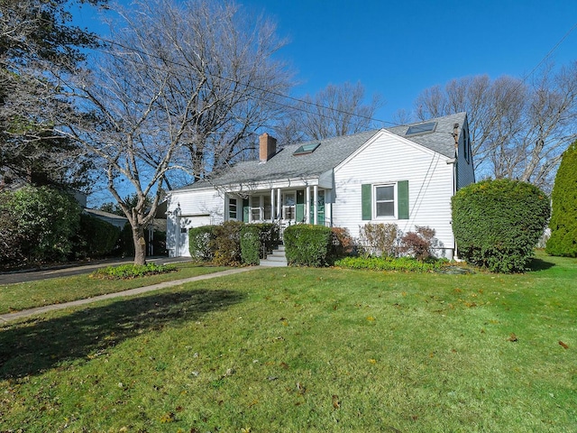 cape cod home with a front lawn and covered porch