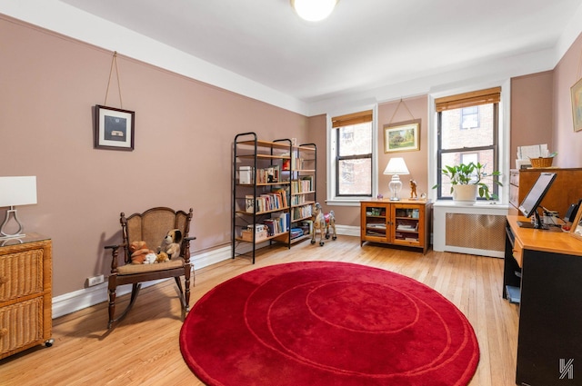 interior space featuring hardwood / wood-style floors and radiator