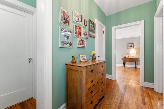 hallway with light wood-type flooring