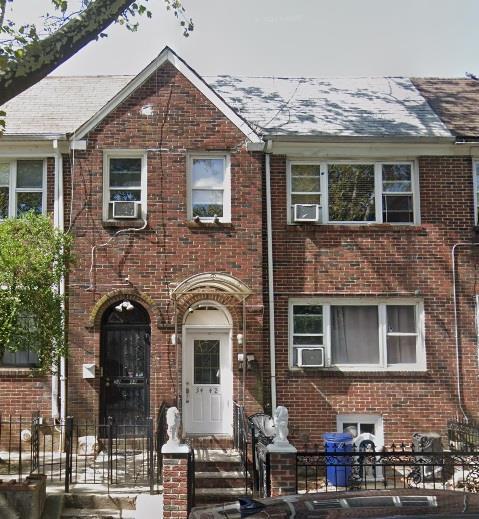 view of front facade with cooling unit