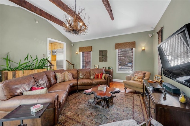 living room with hardwood / wood-style flooring, vaulted ceiling with beams, a wealth of natural light, and an inviting chandelier