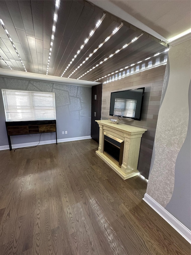 unfurnished living room with wood-type flooring