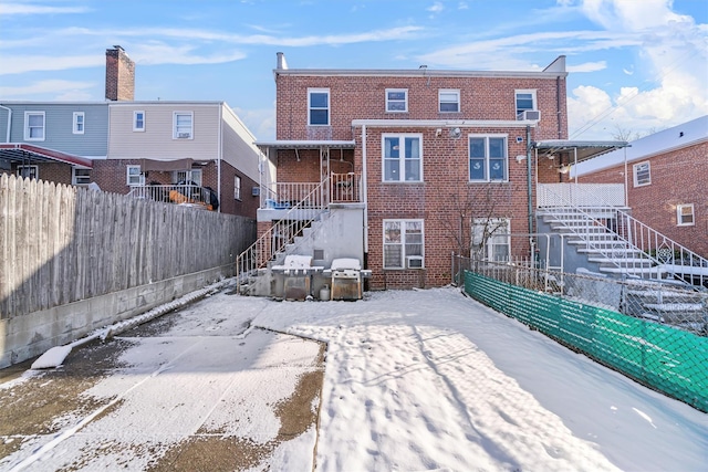 view of snow covered property