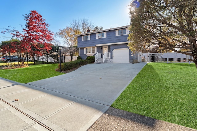 view of front facade featuring a garage and a front lawn