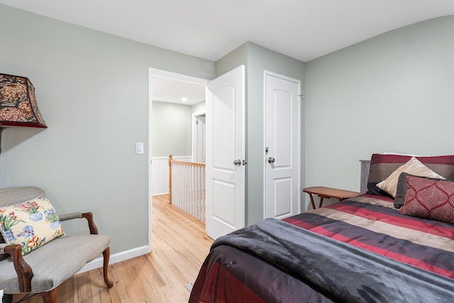 bedroom with light hardwood / wood-style floors