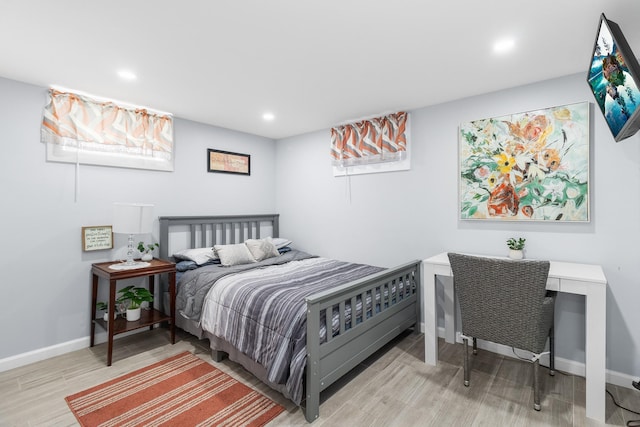 bedroom featuring light hardwood / wood-style flooring