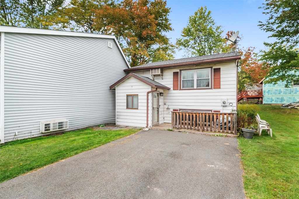 exterior space featuring a front lawn