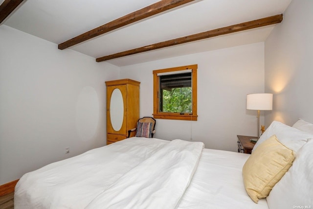 bedroom with hardwood / wood-style flooring