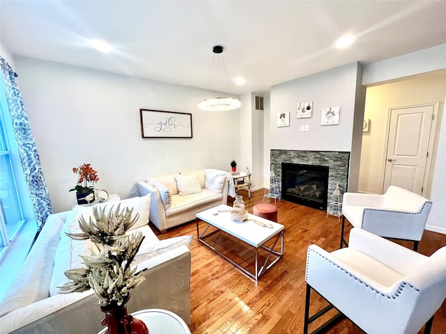 living room with light hardwood / wood-style floors