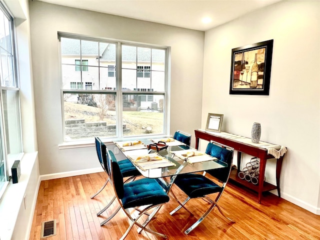 dining area featuring hardwood / wood-style flooring