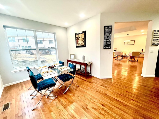 dining room featuring wood-type flooring