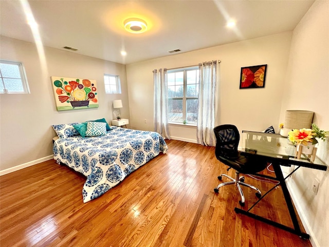 bedroom featuring hardwood / wood-style floors