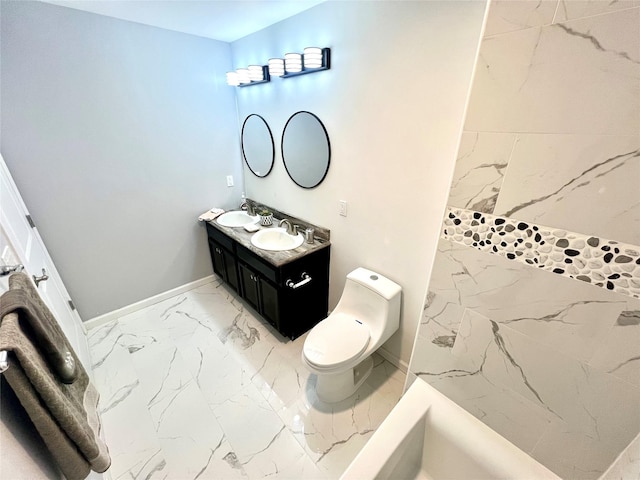 bathroom with toilet and vanity