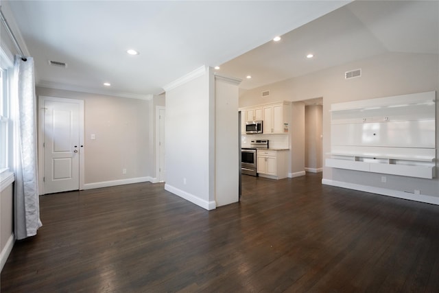 unfurnished living room featuring crown molding, dark hardwood / wood-style flooring, and lofted ceiling