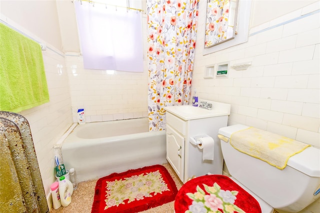 full bathroom featuring shower / tub combo with curtain, vanity, tile walls, and toilet