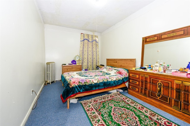 carpeted bedroom with radiator and crown molding