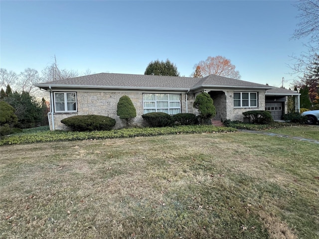 ranch-style home with a front yard