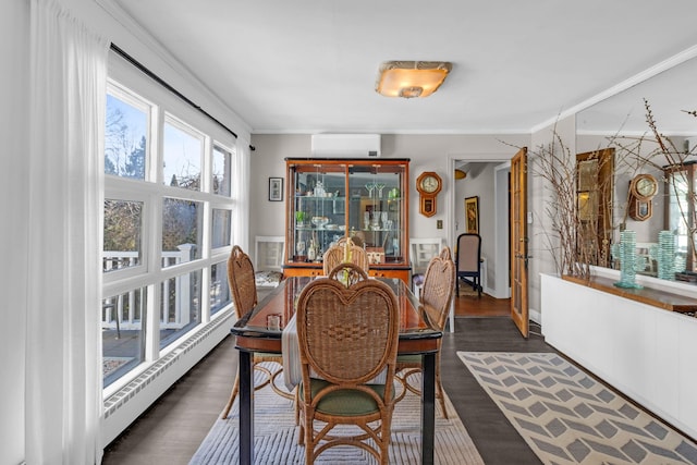 dining room with dark hardwood / wood-style floors, an AC wall unit, baseboard heating, and ornamental molding