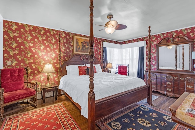 bedroom featuring ceiling fan and dark hardwood / wood-style flooring