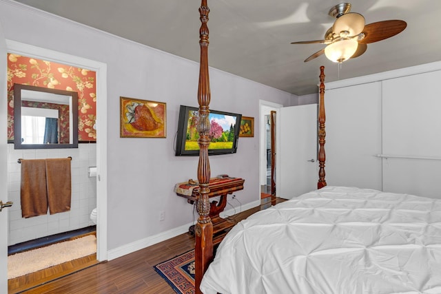 bedroom with ceiling fan, dark hardwood / wood-style flooring, and a closet